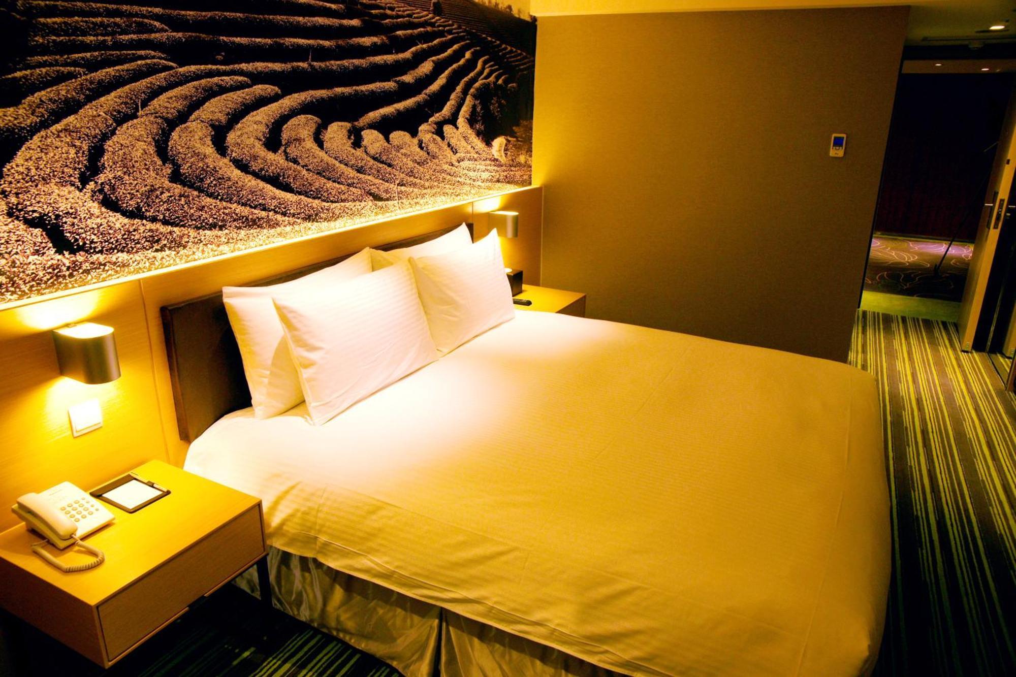Tao Garden Hotel Таоуан Стая снимка